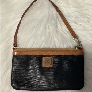 Women’s clutch bag by Kate Spade